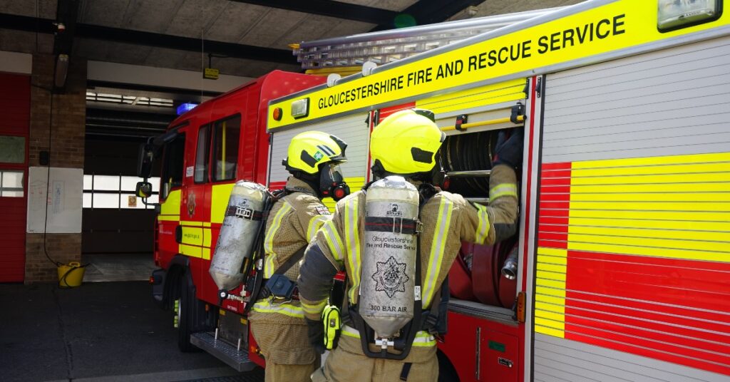 Glos Fire and Rescue Service fire engine and firefighters